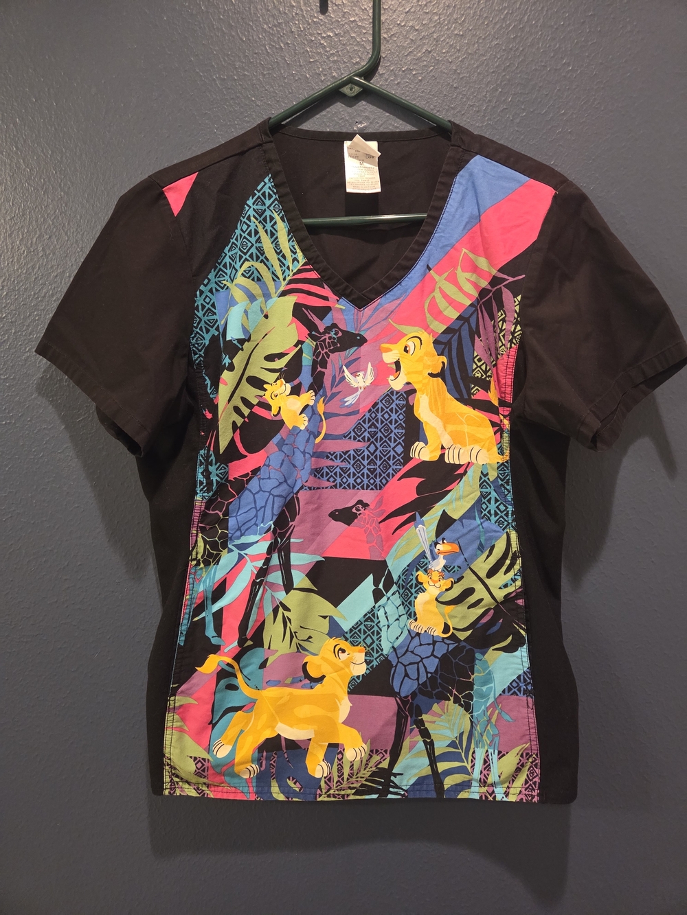 Disney Womenโs Medical Scrub Top Size M Black/Multicolor Lion King